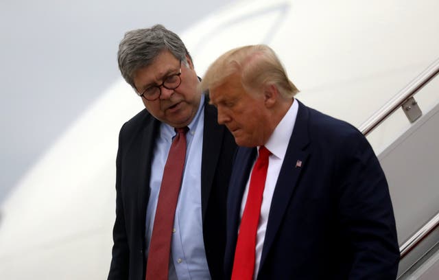 Donald Trump and Attorney General Bill Barr arrive back in Washington aboard Air Force One after a day trip to Kenosha, Wisconsin