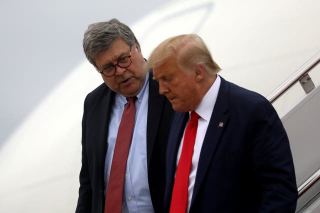 <p>Donald Trump and Attorney General Bill Barr arrive back in Washington aboard Air Force One after a day trip to Kenosha, Wisconsin</p>