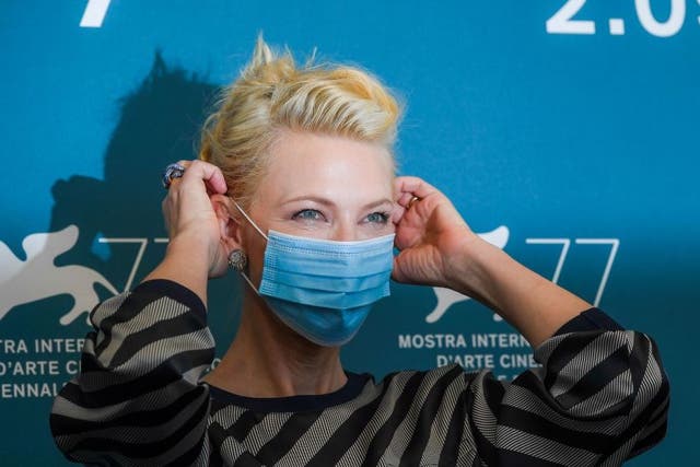 A masked Cate Blanchett attends the opening photocall for this year's Venice Film Festival
