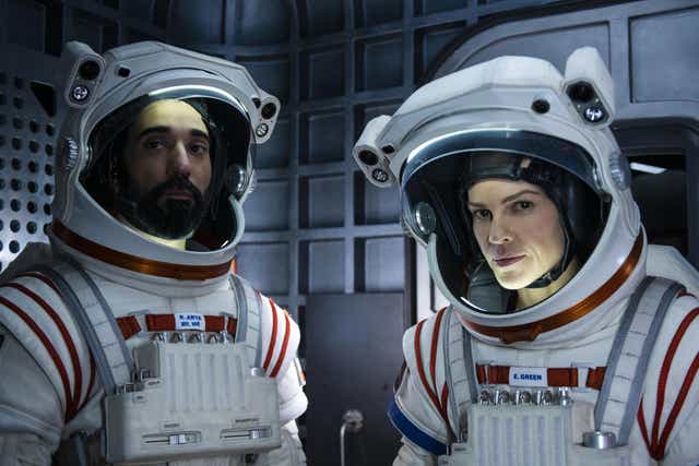 Ray Panthaki and Hillary Swank in 'Away'