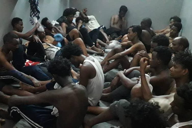 Refugees inside the Zintan detention centre in 2019