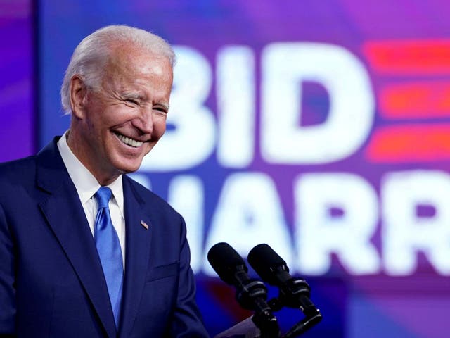 Joe Biden smiles at a press conference in Delaware