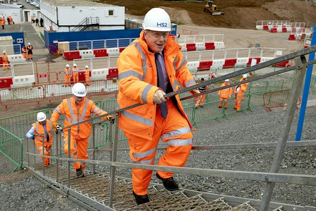 <p>Uphill struggle: Boris Johnson visits an HS2 construction site this year</p>