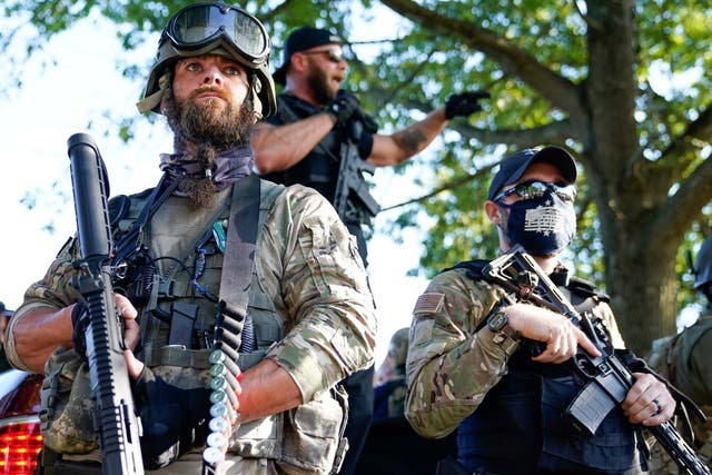 Armed militia members carried semi-automatic guns when interacting with Breonna Taylor protesters 