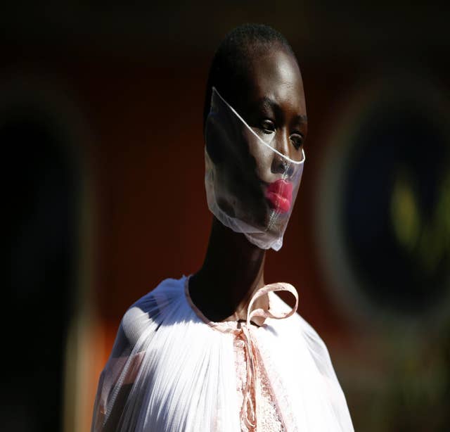 A model presents a creation during the Bora Aksu catwalk show at London Fashion Week 2020