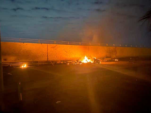 <p>A burning vehicle at the Baghdad International Airport after an airstrike in January. US military killed General Qassem Soleimani at the direction of Trump</p>