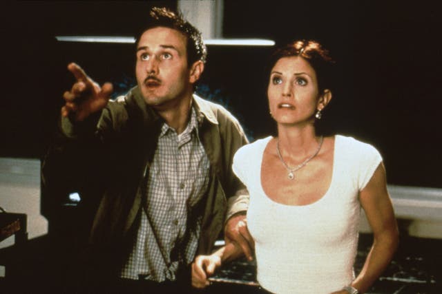 <p>Arquette and his former wife Courteney Cox in ‘Scream 2’ (19</p>