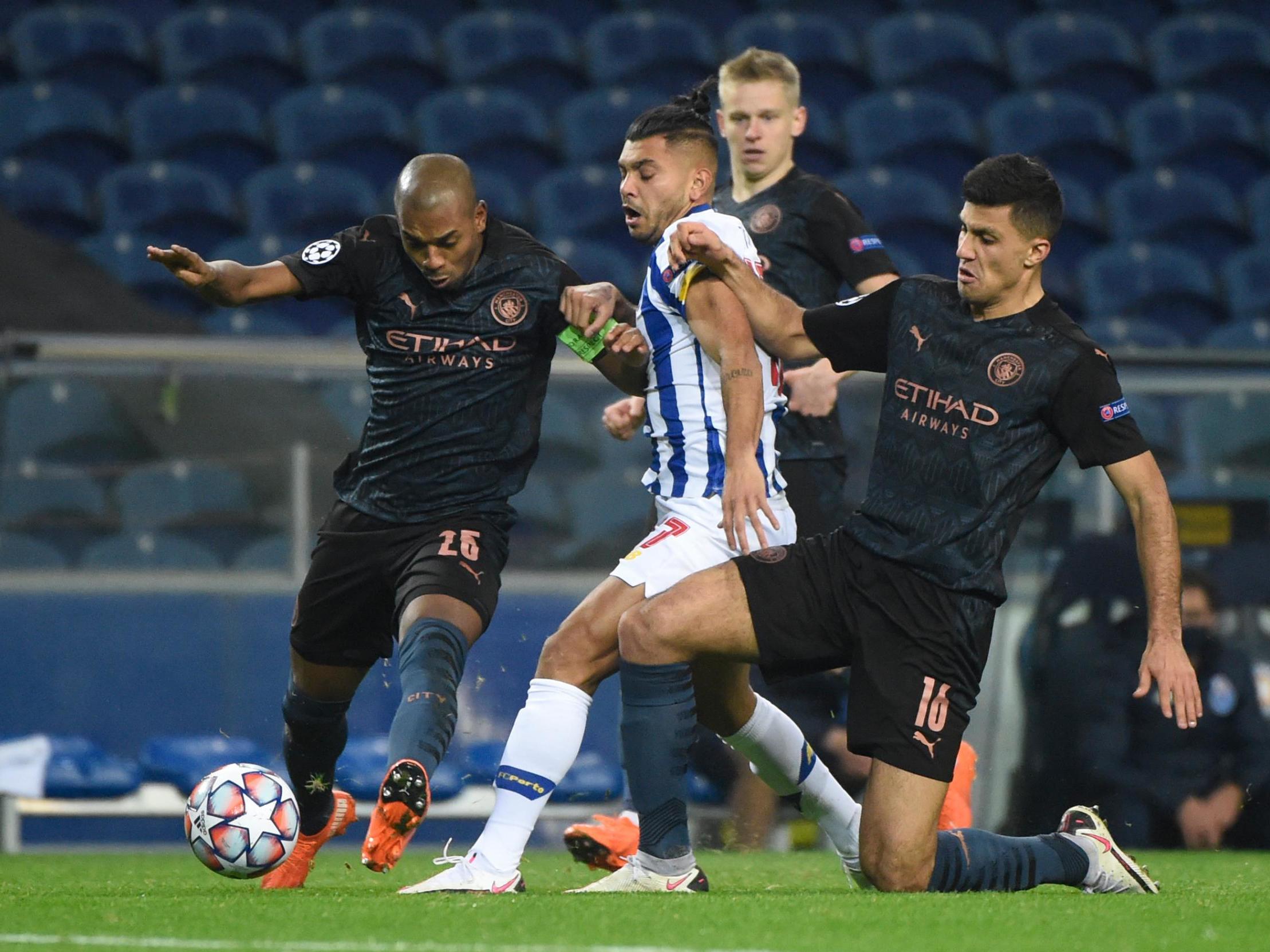 <p>Fernandinho (left) and Rodri (right) did good defensive work in midfield against Porto</p>