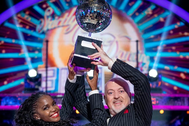 <p>Oti Mabuse and Bill Bailey celebrate their victory on Saturday</p>