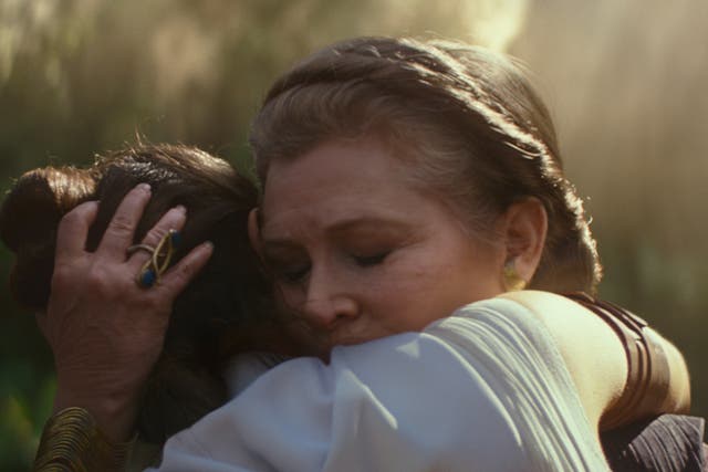 <p>A last goodbye: Leia (Carrie Fisher) embraces Rey (Daisy Ridley) in 2019’s The Rise of Skywalker</p>