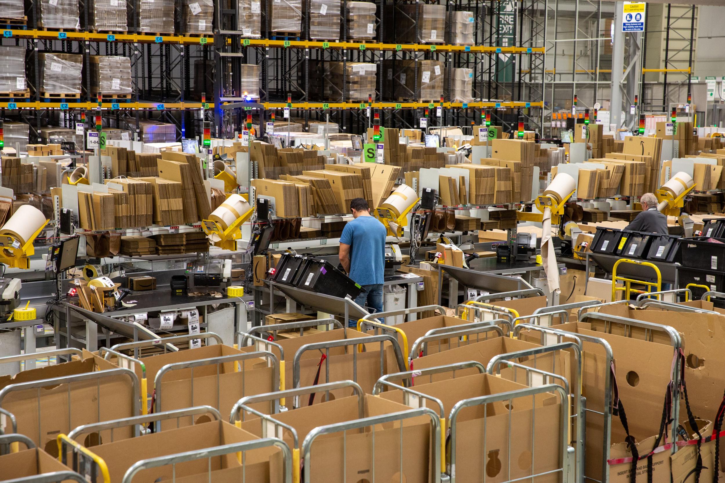 File: The California bill will require warehouse operators such as Amazon, Walmart and Target to disclose productivity quotas and work speed metrics