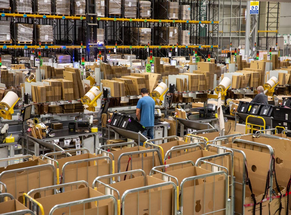 <p>File: The California bill will require warehouse operators such as Amazon, Walmart and Target to disclose productivity quotas and work speed metrics  </p>