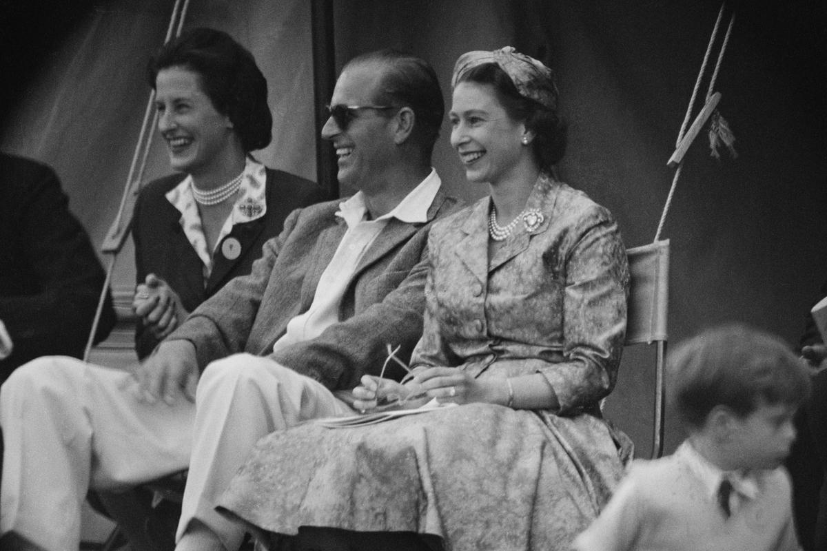 The Queen and Prince Philip at a cricket match at Highclere in 1958