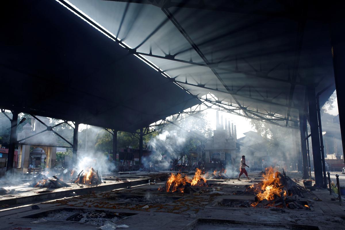 <p>(Representative/FILE) Funeral pyres seen in Indian capital Delhi </p>