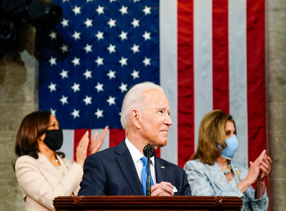 <p>Joe Biden with Kamala Harris (left) and Nancy Pelosi in the Capitol</p>
