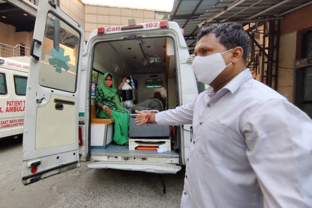 <p>File: Indian Youth Congress leader Srinivas BV seen helping patients during the brutal Covid wave in India in April 2021 </p>