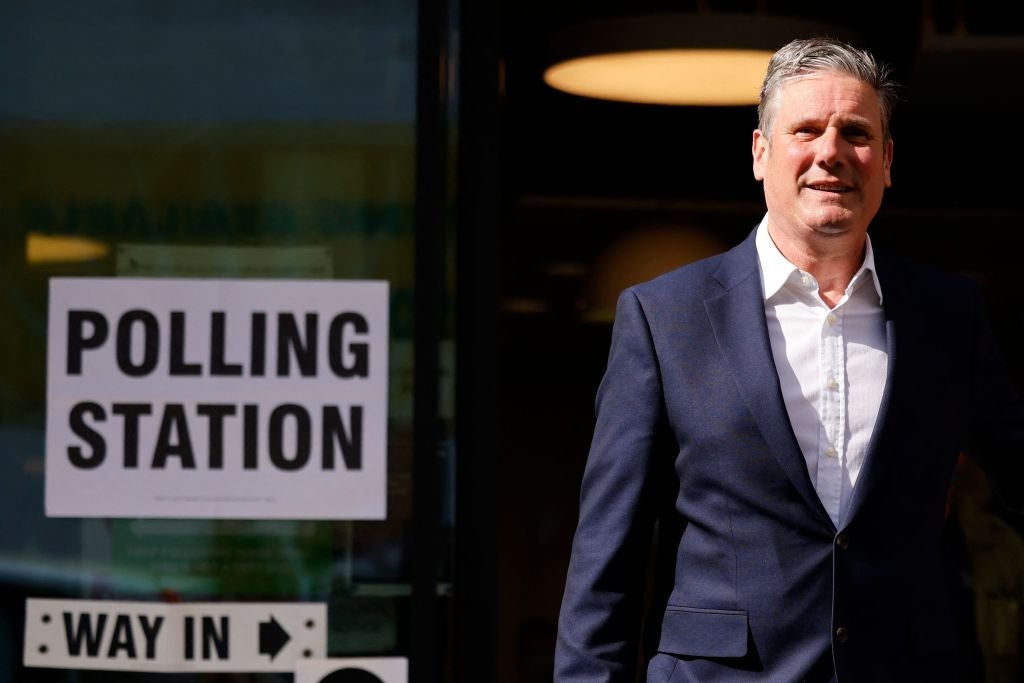 Opposition Labour party leader Keir Starmer leaves a polling station