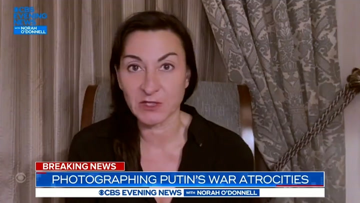 'This is a war crime': US photographer defends taking image of dead Ukrainian family