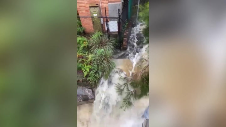 Dam spills over following heavy rain in Sydney