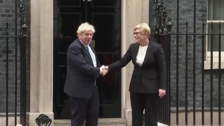 Lithuanian PM jumps as Boris Johnson greets her at Downing Street door