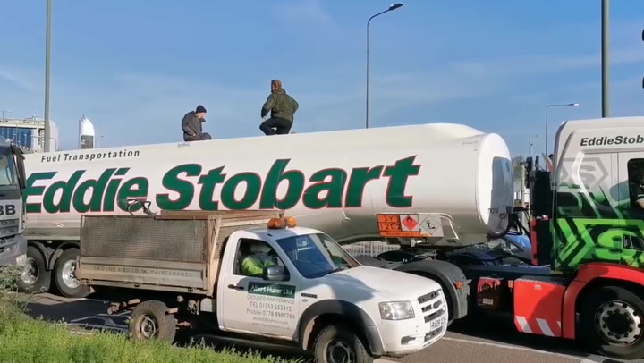 Activists climb on top of lorry at 'Just Stop Oil' protest