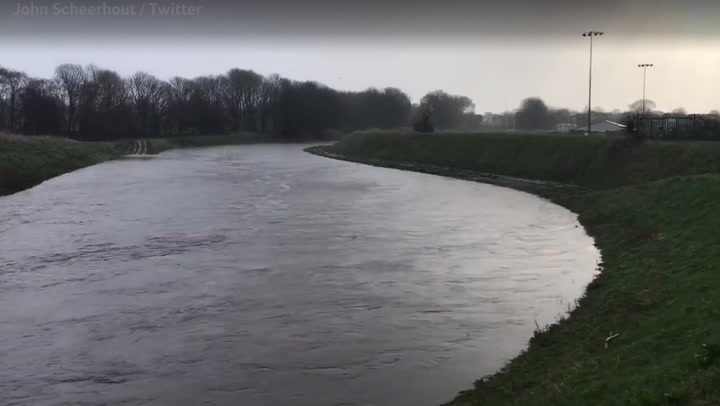 Storm Franklin: River flooded in Manchester as heavy rain hits city