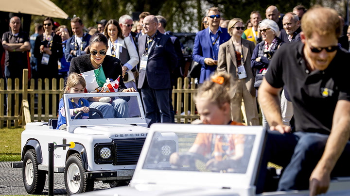 Harry and Meghan enjoy spin in tiny cars as they take on Invictus Games challenge