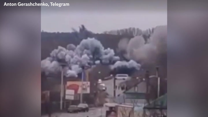 Ukrainian forces destroy bridge as Russian troops close in on Kyiv