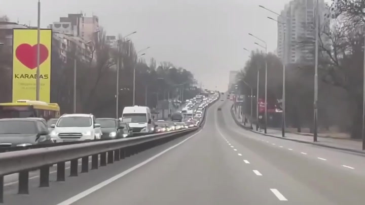 Long car queues as Ukrainians attempt to flee amid Russian invasion