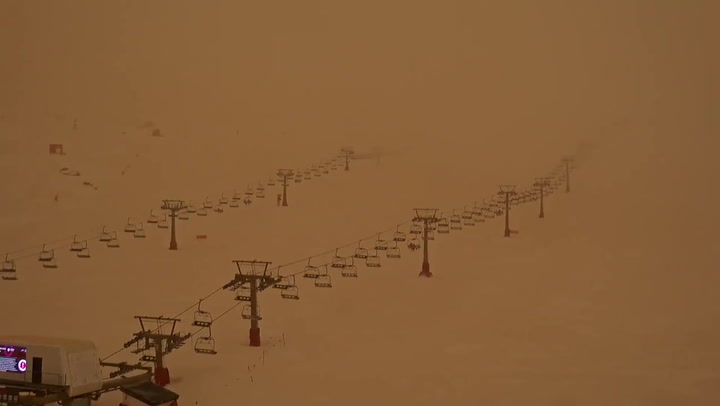 Spain: Dust from Sahara transforms Sierra Nevada ski slopes into Martian landscape