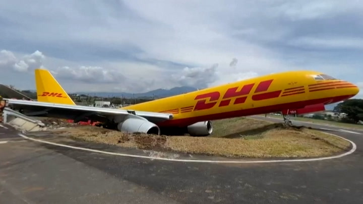 Footage shows damaged cargo plane broken in half after emergency landing