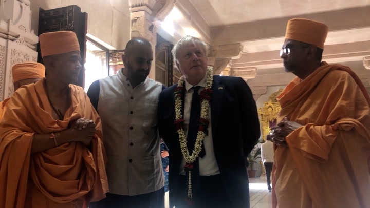 Boris Johnson visits Hindu temple in India