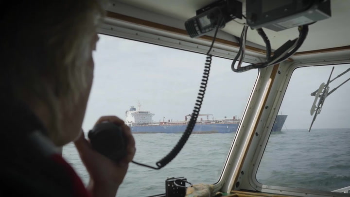 British activists confront oil tanker carrying a 42,000-tonne shipment of Russian fuel oil